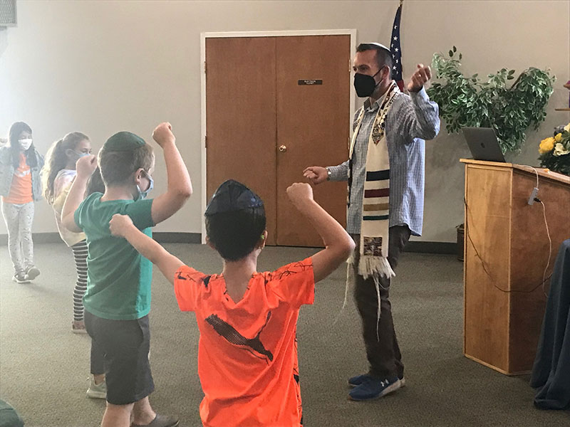 kids dancing with their teacher